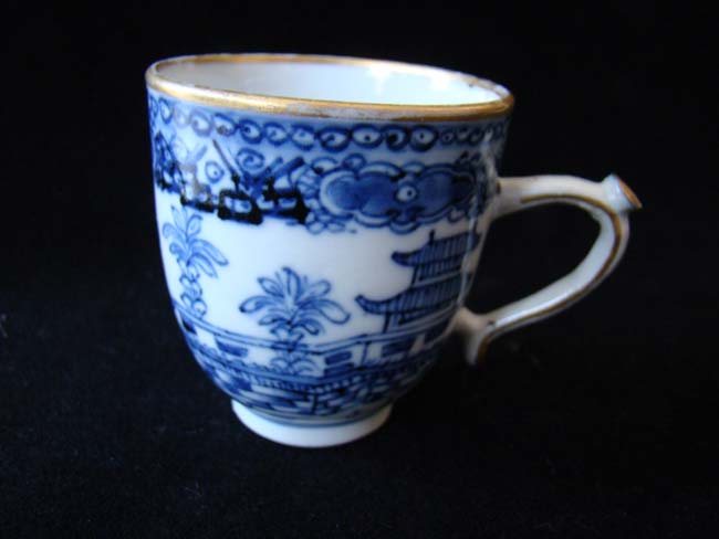 A fine late 18th century Chinese Export Porcelain coffee cup with gilt hightlights.